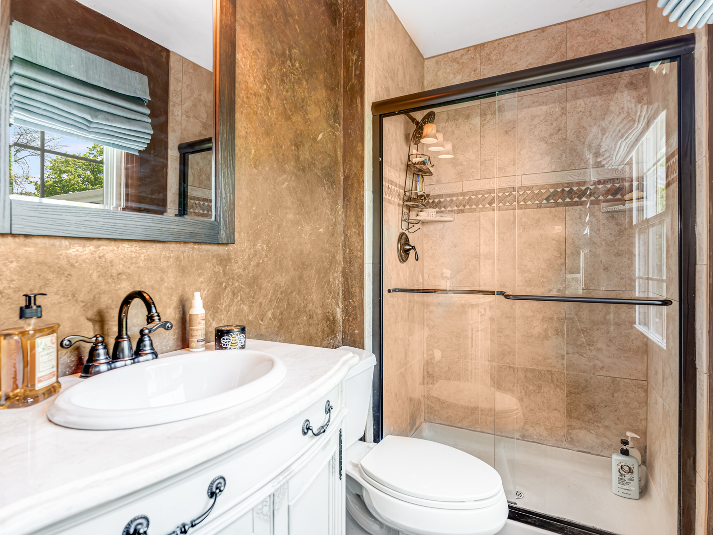 302 Delaware Drive Bolingbrook, IL 60440 - Photo 12 of 21 a bathroom with a sink and a mirror