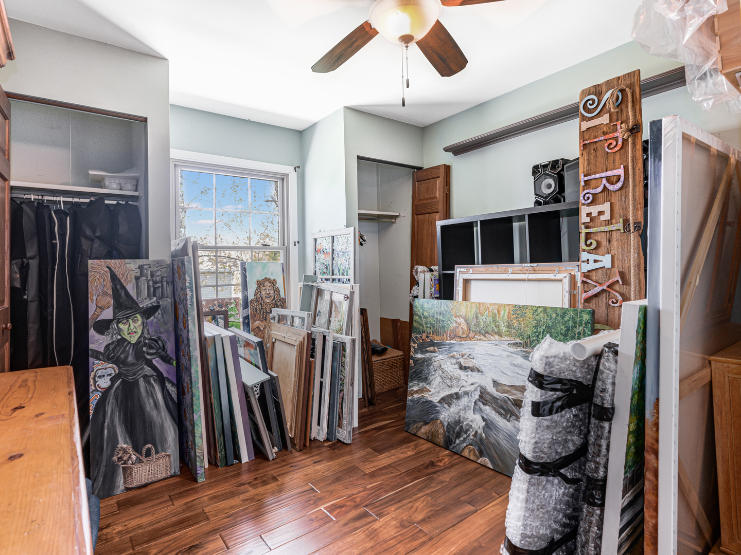 302 Delaware Drive Bolingbrook, IL 60440 - Photo 14 of 21 a living room with furniture and a flat screen tv