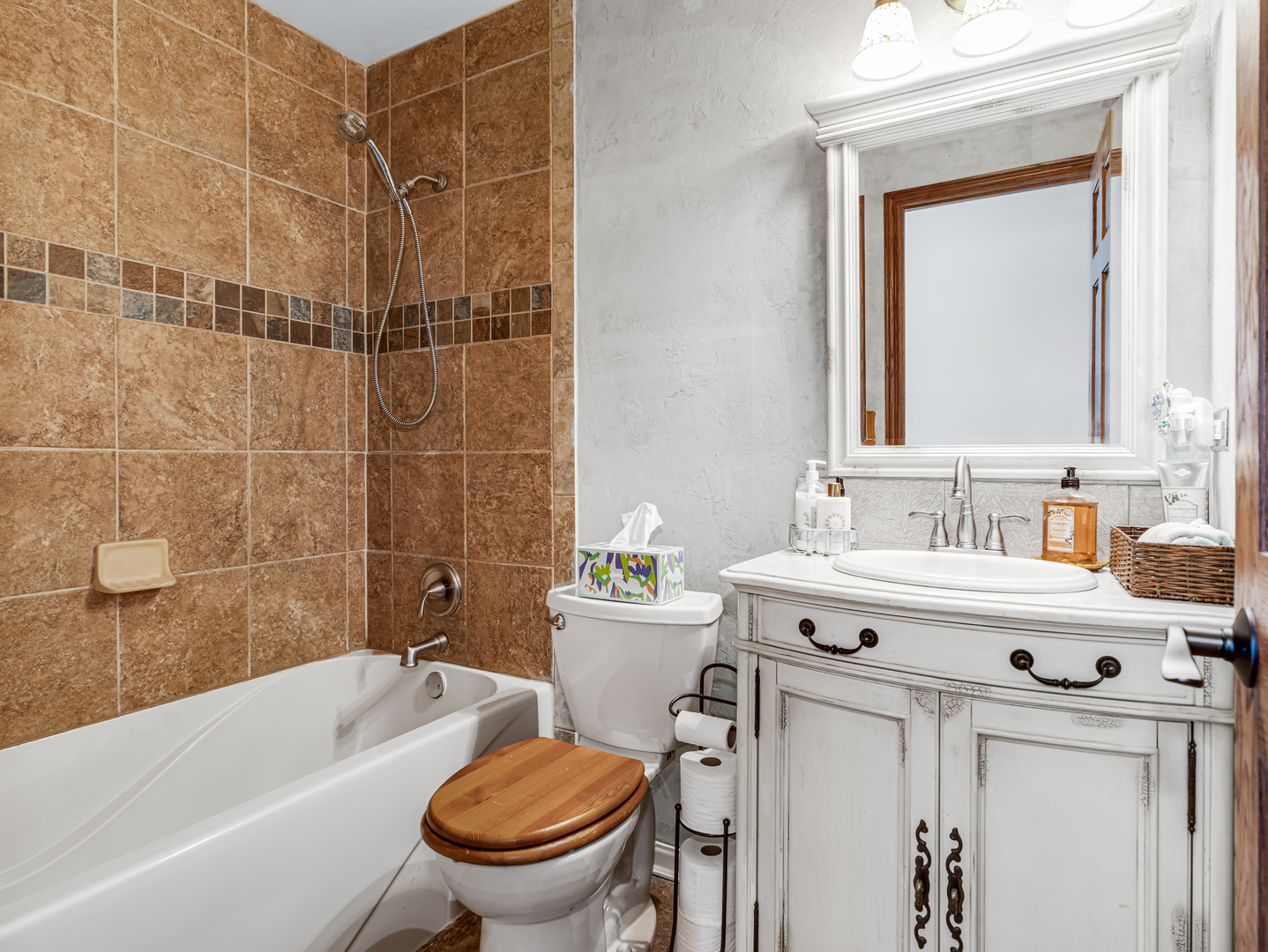 302 Delaware Drive Bolingbrook, IL 60440 - Photo 15 of 21 a bathroom with a sink toilet tub and shower