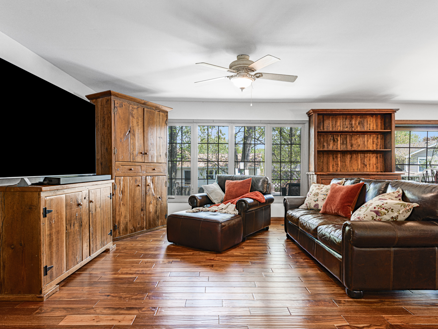 302 Delaware Drive Bolingbrook, IL 60440 - Photo 2 of 21 a living room with furniture and a flat screen tv