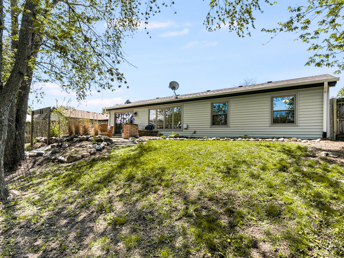 302 Delaware Drive Bolingbrook, IL 60440 - Photo 21 of 21 a front view of a house with garden