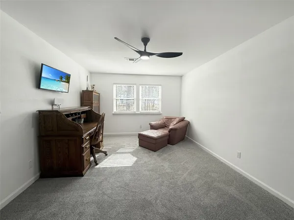 a room with furniture and a window