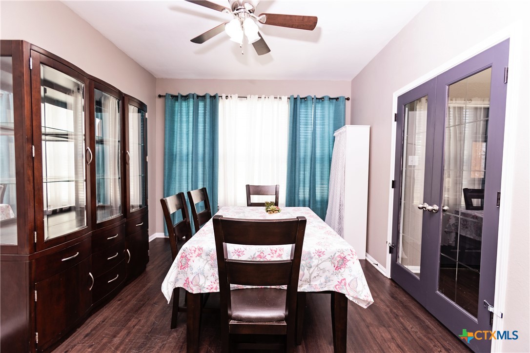 612 Pumpkin Drive Temple, TX 76502 - Photo 14 of 33 a view of a dining room with furniture window and wooden floor