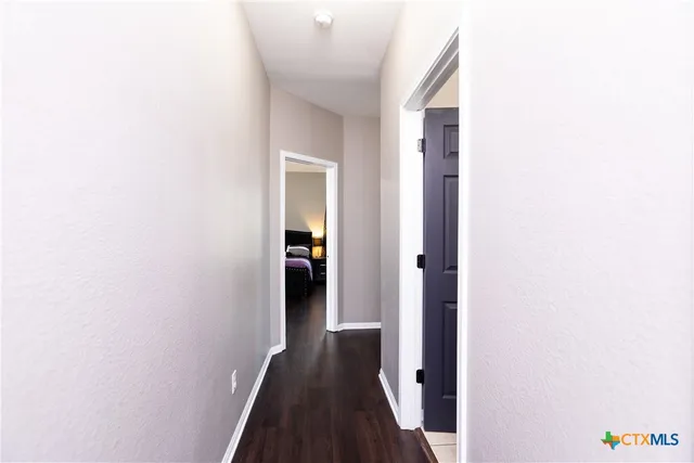wooden floor and windows in an empty room
