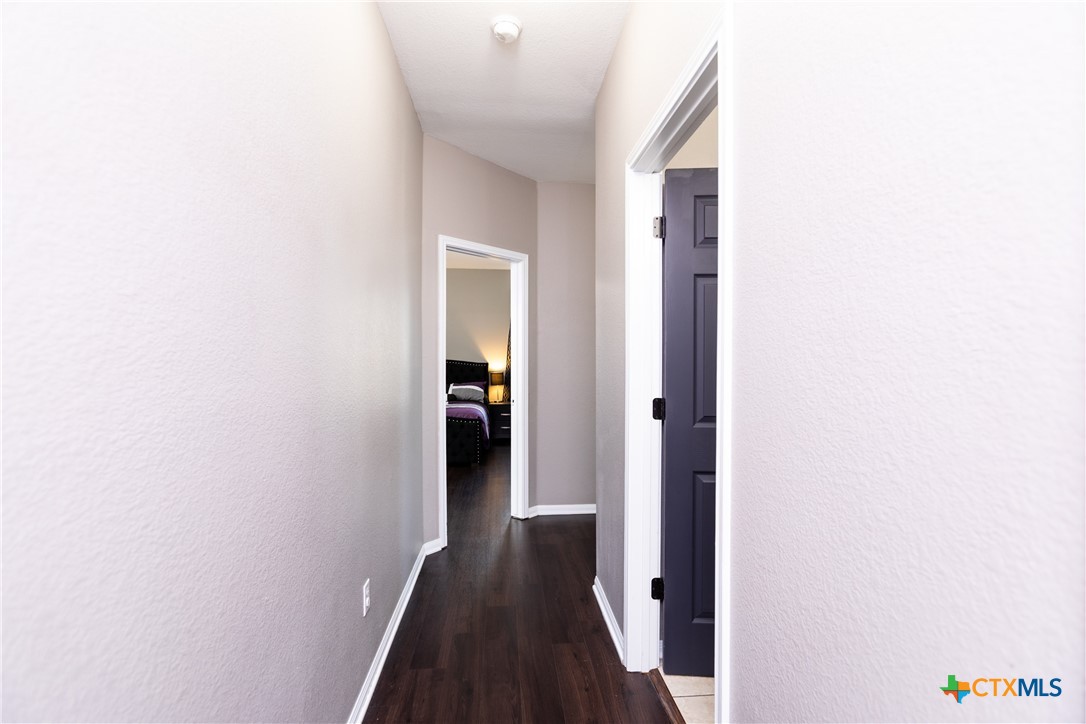 612 Pumpkin Drive Temple, TX 76502 - Photo 15 of 33 a view of a hallway with wooden floor