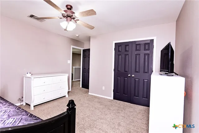 a view of living room with granite countertop furniture and fireplace
