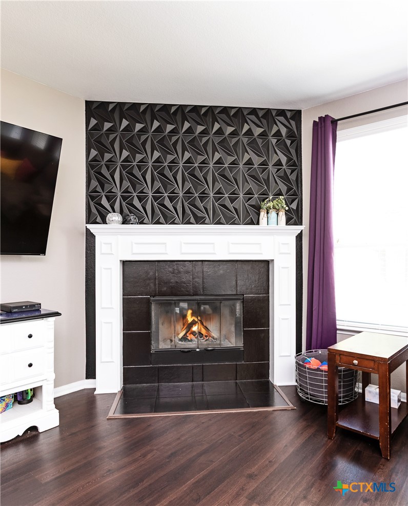 612 Pumpkin Drive Temple, TX 76502 - Photo 6 of 33 a living room with furniture and a fireplace