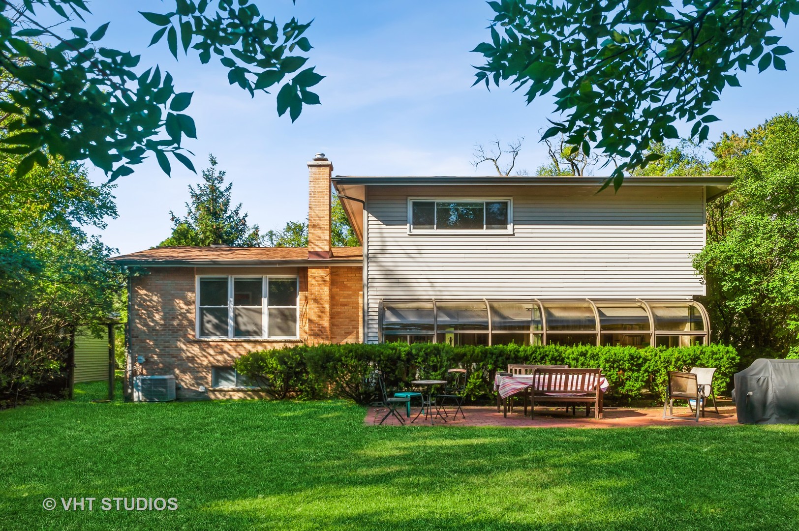 839 Sumac Road Highland Park, IL 60035 - Photo 15 of 19 a front view of house with yard and outdoor seating