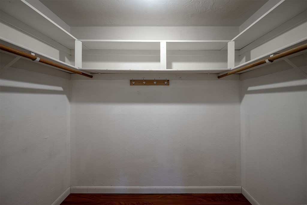 57 Will Drive, Unit 170 Canton, MA 02021 - Photo 11 of 15 a view of walk in closet with empty racks
