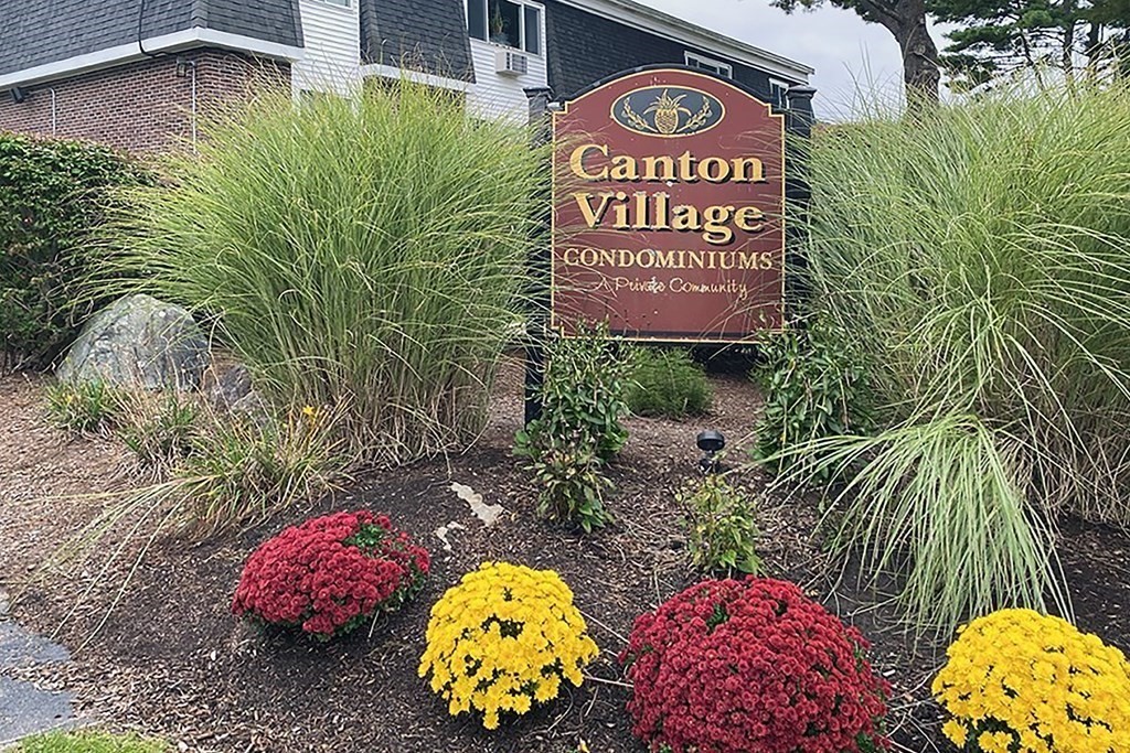 57 Will Drive, Unit 170 Canton, MA 02021 - Photo 14 of 15 a sign that is in front of the house