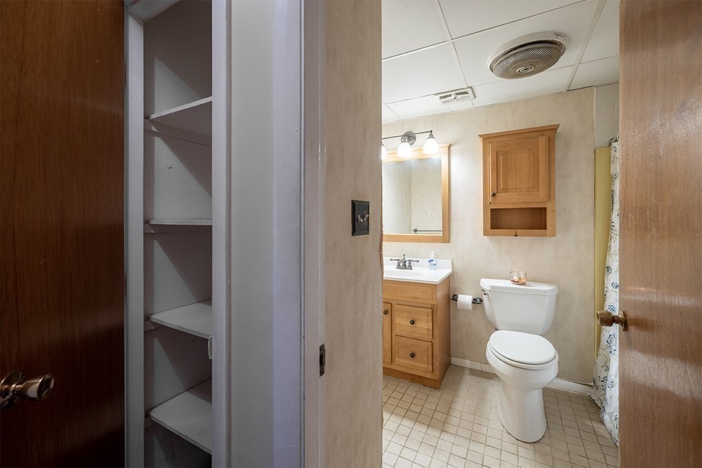 57 Will Drive, Unit 170 Canton, MA 02021 - Photo 9 of 15 a bathroom with a toilet