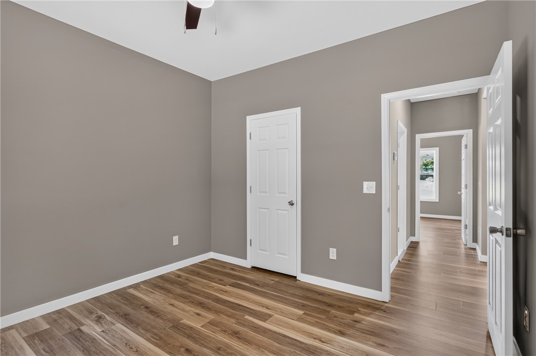223 Maple Drive Anderson, SC 29621 - Photo 29 of 45 A quiet retreat, this bedroom offers durable flooring and a ceiling fan for comfort.