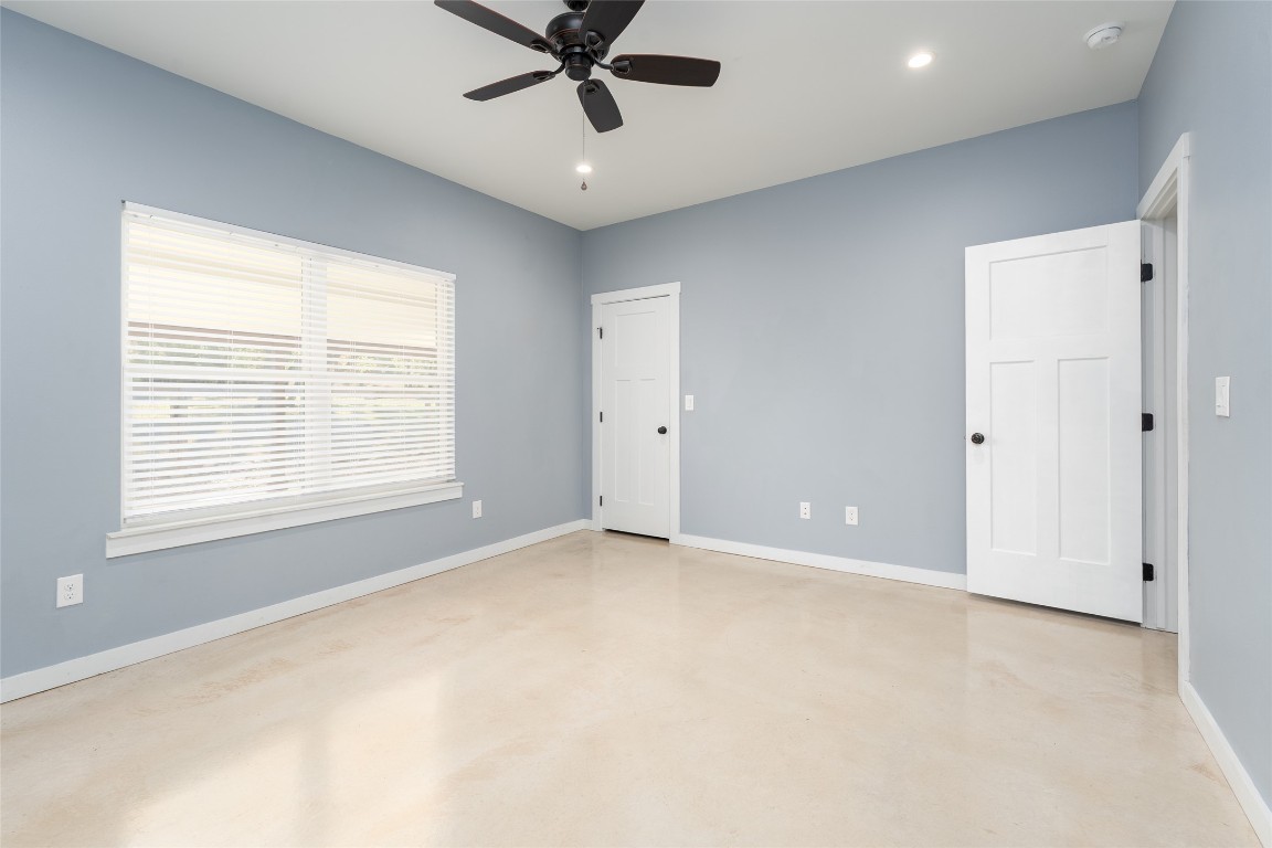 33 Deer Ridge Road Wimberley, TX 78676 - Photo 27 of 40 a view of an empty room with a window