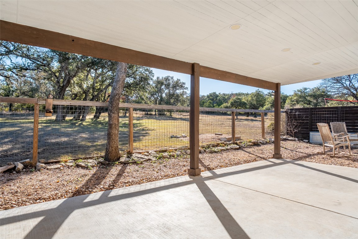 33 Deer Ridge Road Wimberley, TX 78676 - Photo 33 of 40 a view of a living room and a floor to ceiling window