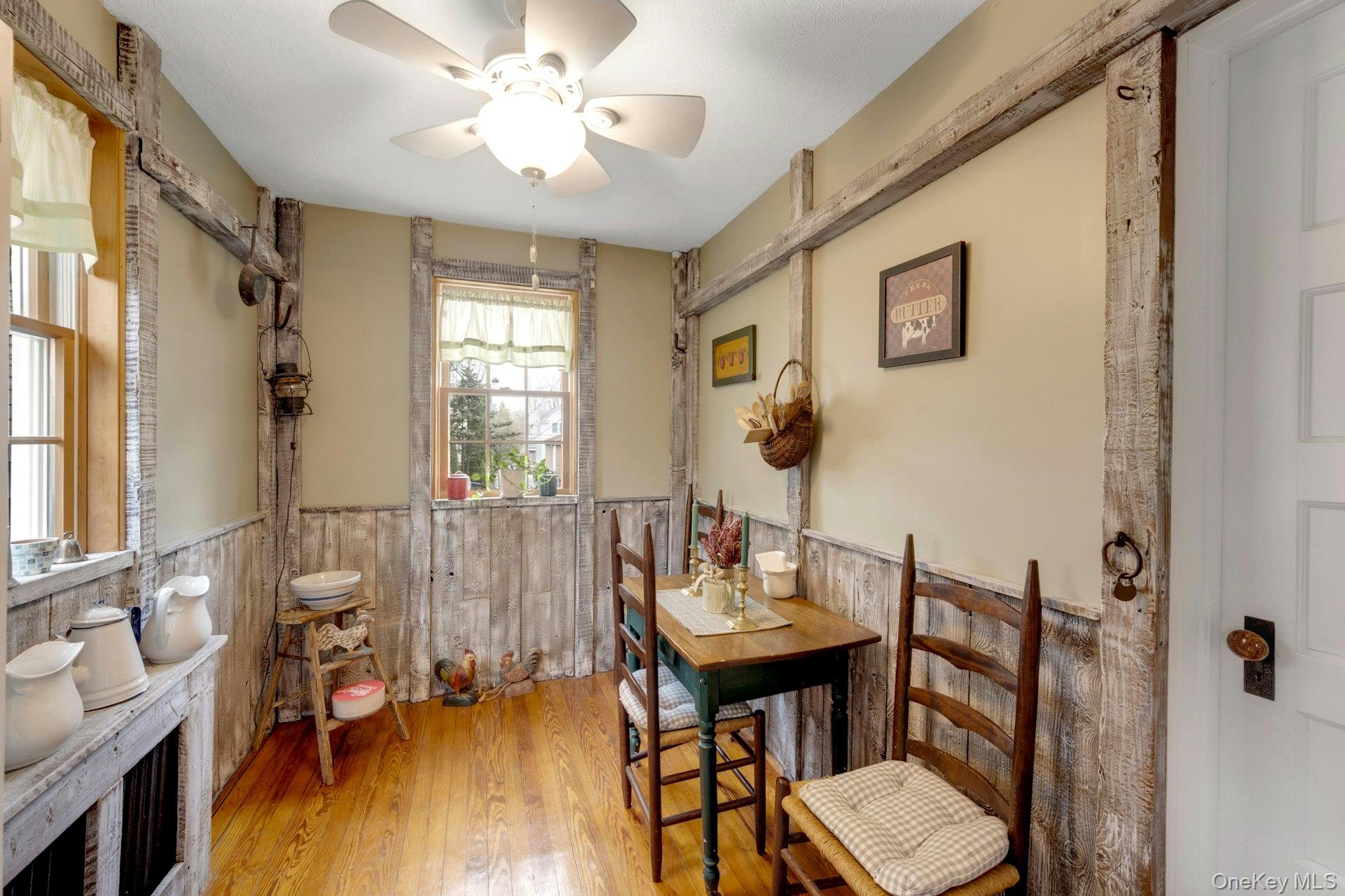 343 Rye Beach Avenue Rye, NY 10580 - Photo 11 of 35 a view of a a dining room with furniture window and wooden floor