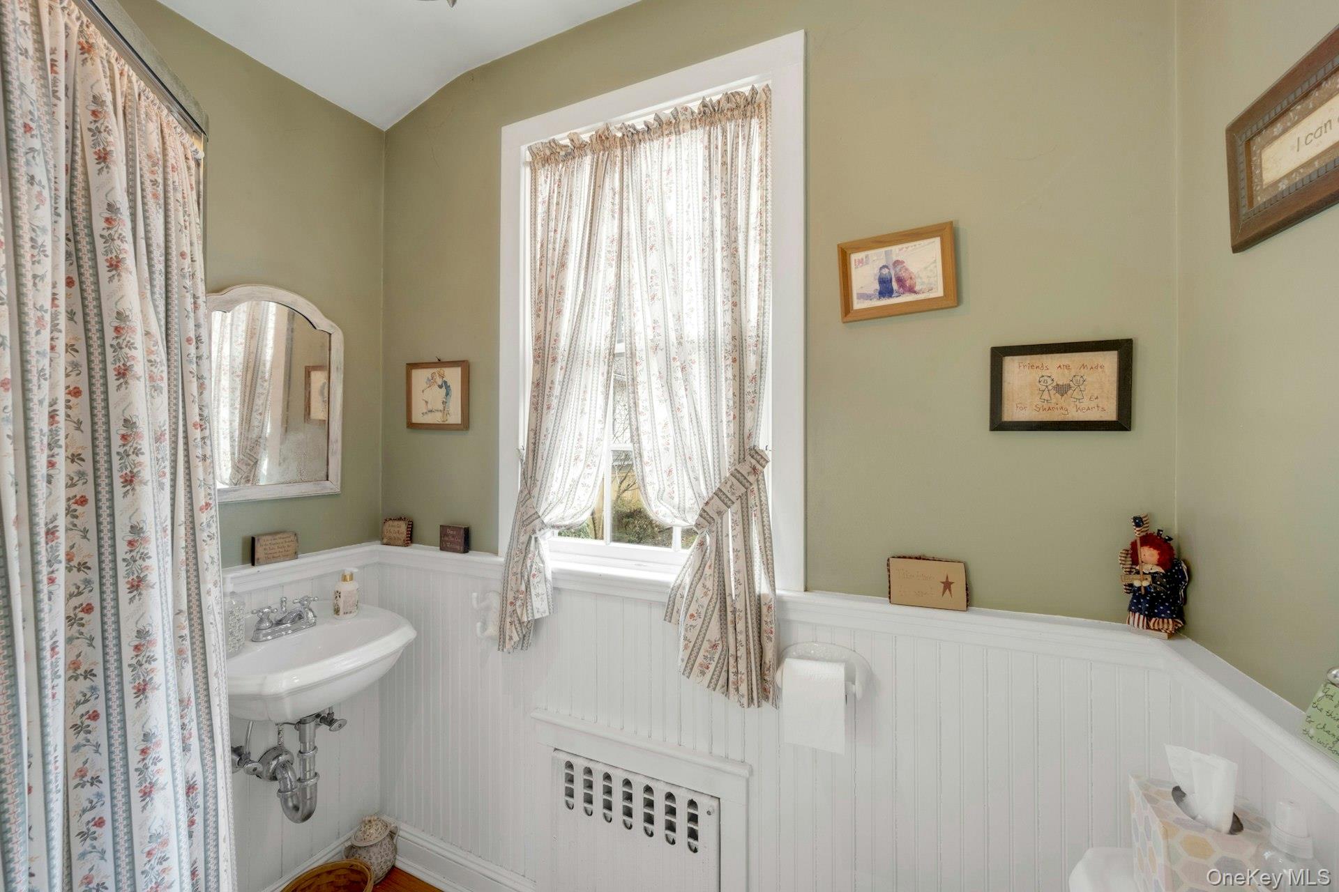 343 Rye Beach Avenue Rye, NY 10580 - Photo 16 of 35 a spacious bathroom with a bathtub and a sink