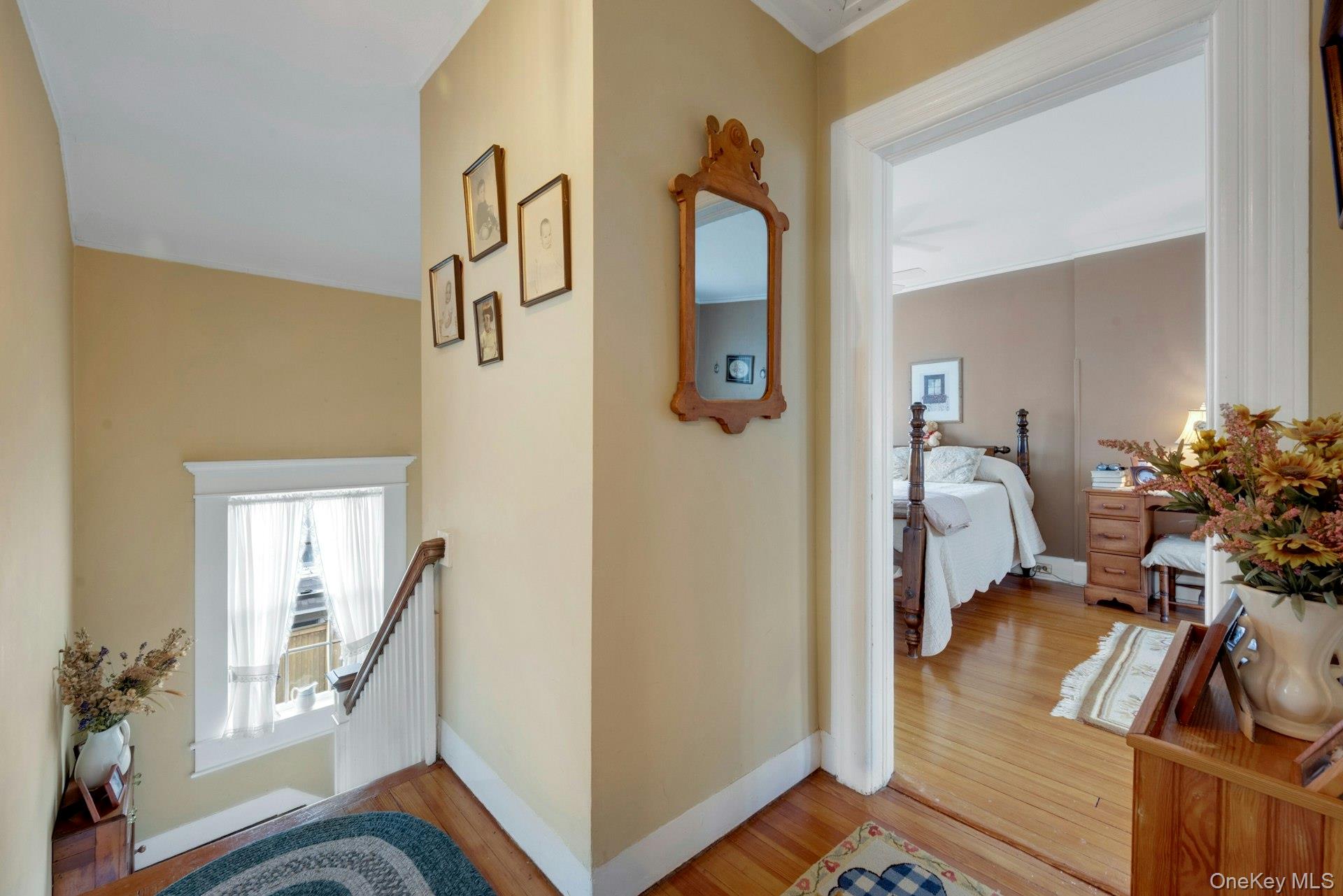 343 Rye Beach Avenue Rye, NY 10580 - Photo 17 of 35 a view of a hallway with workspace and windows