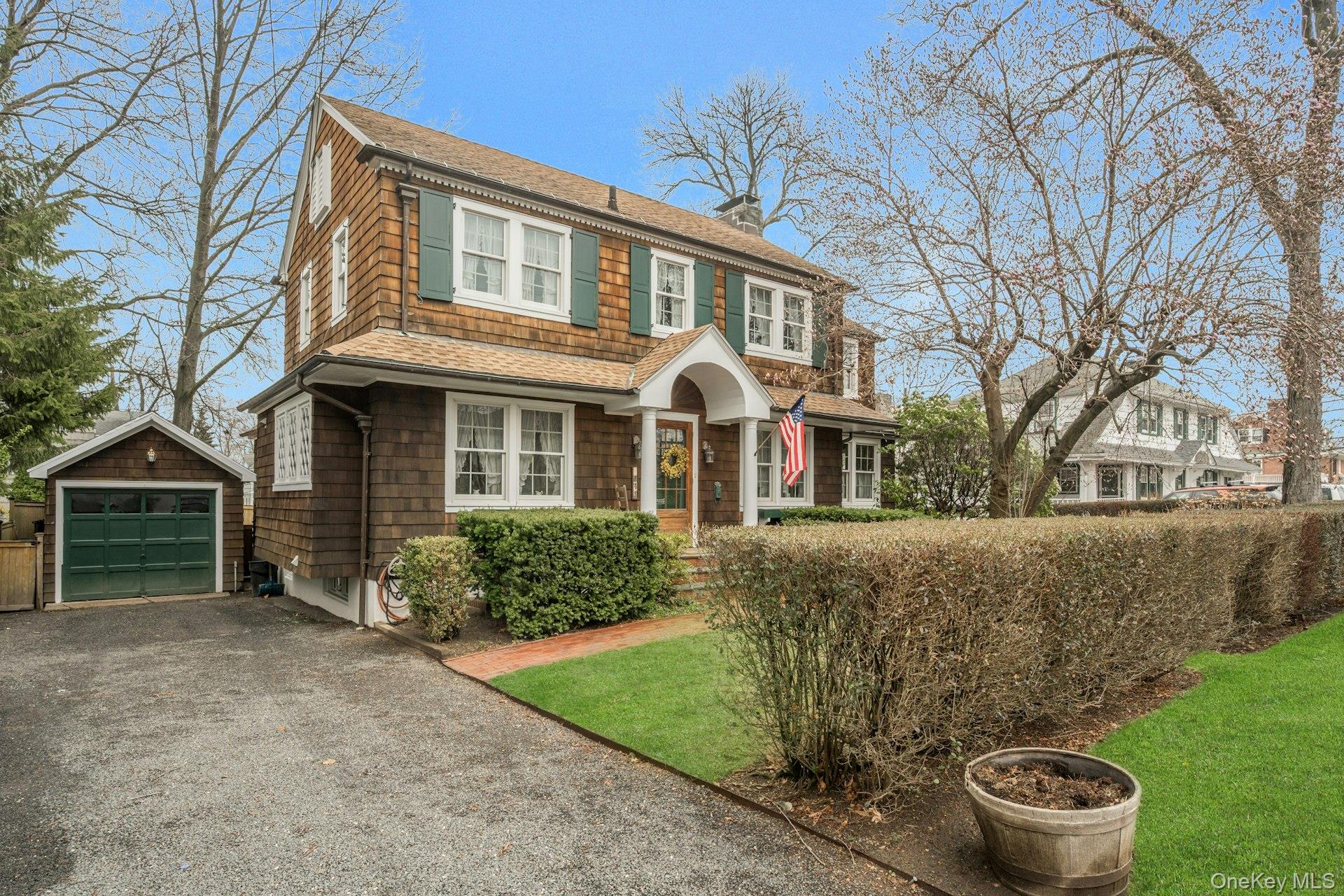 343 Rye Beach Avenue Rye, NY 10580 - Photo 33 of 35 a front view of a house with garden