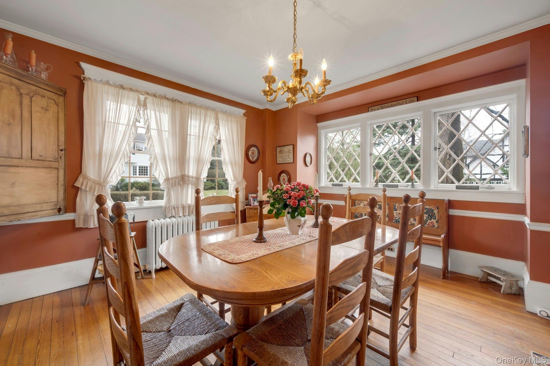 343 Rye Beach Avenue Rye, NY 10580 - Photo 6 of 35 a view of a dining room with furniture window and wooden floor