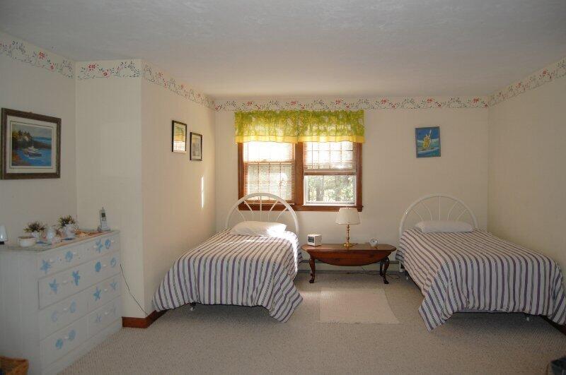 27 Pine View Drive Brewster, MA 02631 - Photo 14 of 17 a bedroom with a bed and a window