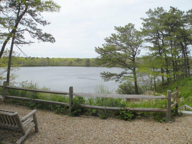 27 Pine View Drive Brewster, MA 02631 - Photo 17 of 17 a view of a lake with houses in background