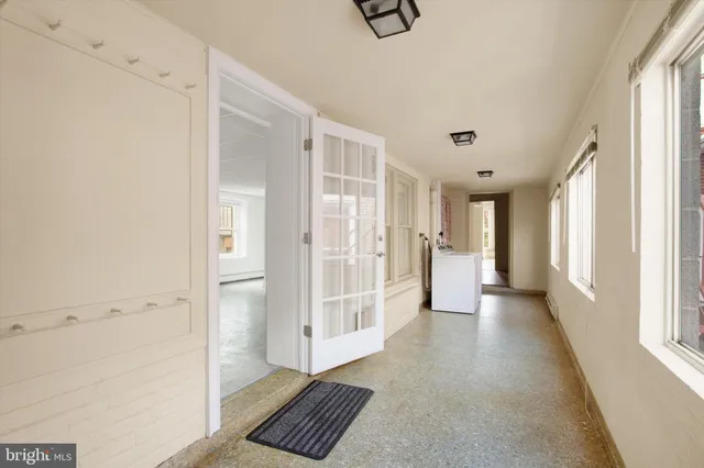 a room with furniture and a window