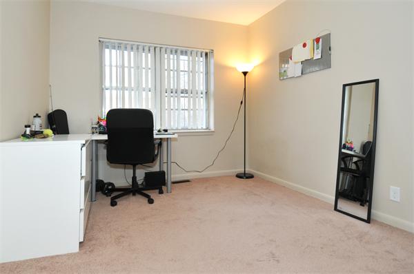 120 Lake Shore Road, Unit 1 Boston, MA 02135 - Photo 7 of 15 a workspace with furniture and a window