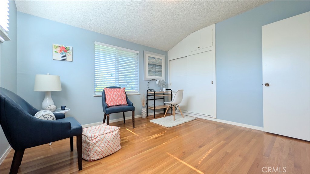 1418 Niagara Avenue Claremont, CA 91711 - Photo 19 of 29 a living room with furniture and wooden floor