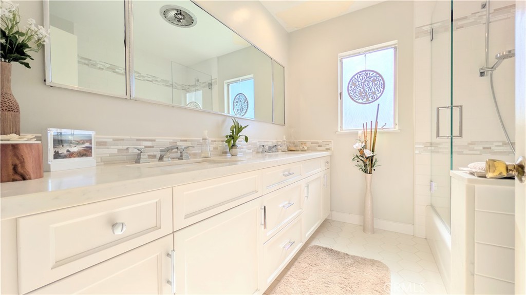 1418 Niagara Avenue Claremont, CA 91711 - Photo 20 of 29 a bathroom with a sink and a mirror
