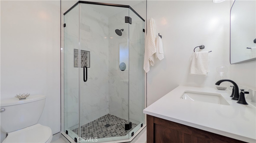 1418 Niagara Avenue Claremont, CA 91711 - Photo 23 of 29 a bathroom with a sink toilet and shower