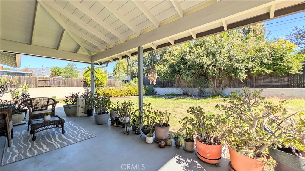 1418 Niagara Avenue Claremont, CA 91711 - Photo 25 of 29 a view of a chairs and table in patio with potted plants