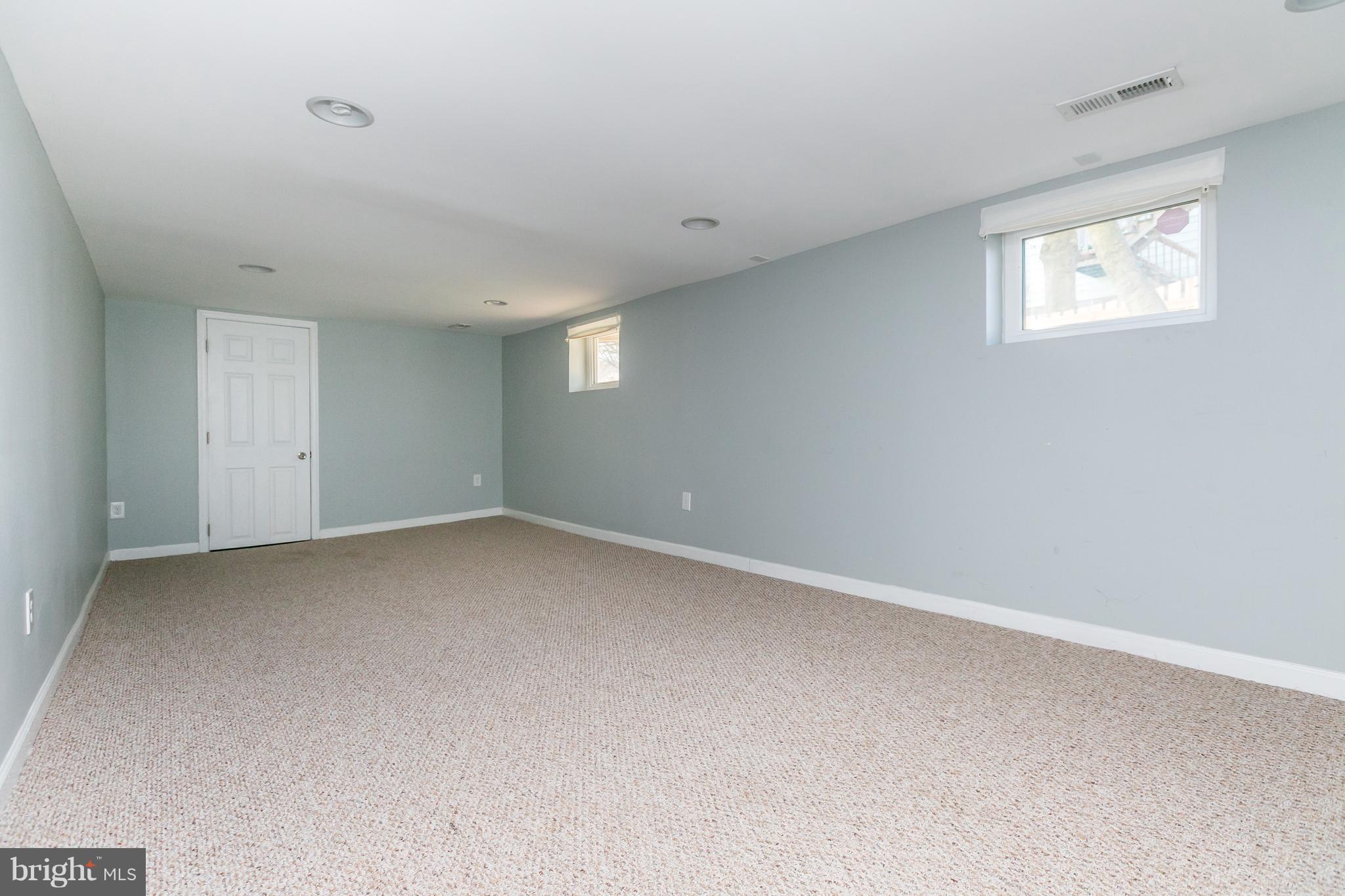 5213 Catalpha Road Baltimore, MD 21214 - Photo 26 of 30 Lower level family room