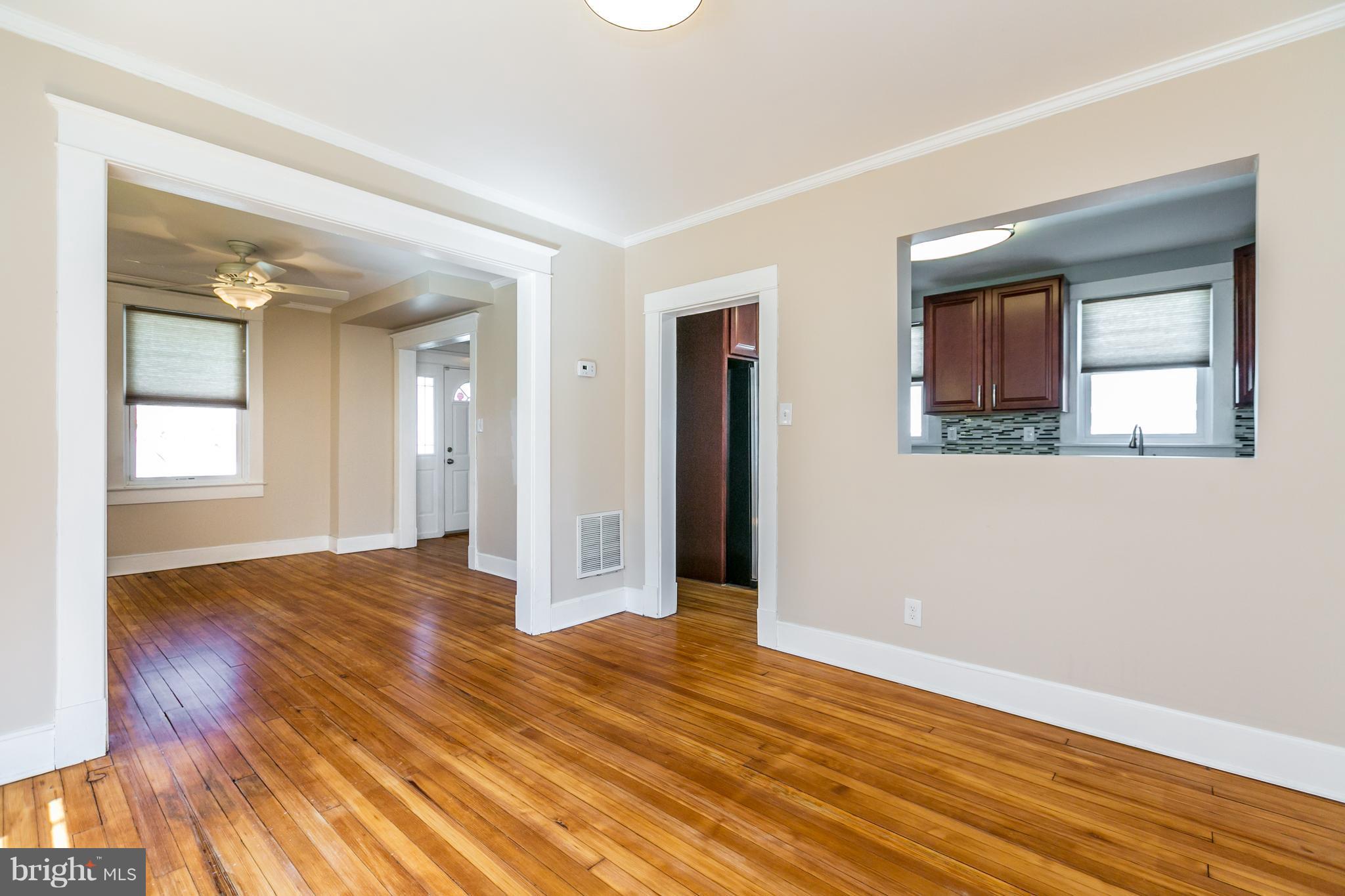 5213 Catalpha Road Baltimore, MD 21214 - Photo 8 of 30 Dining Room pass thru to kitchen