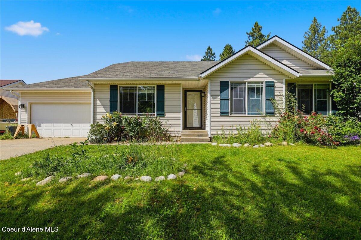 7443 Macaw Lane Rathdrum, ID 83858 - Photo 1 of 28 01-7443 Macaw Ln_RedHogMedia