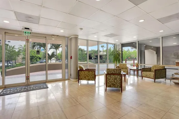 a kitchen with stainless steel appliances granite countertop a stove and a microwave