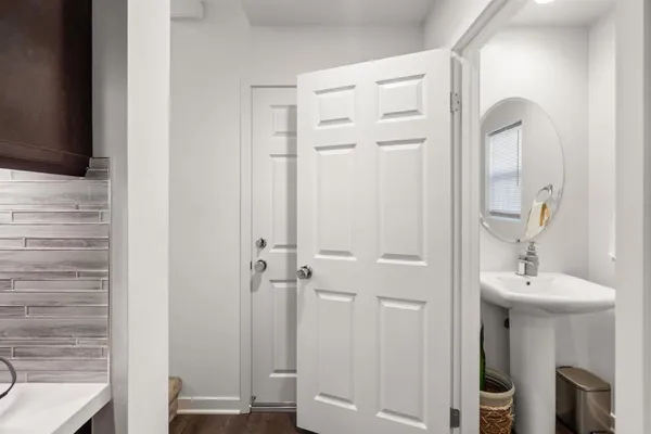 a bathroom with a sink and a mirror
