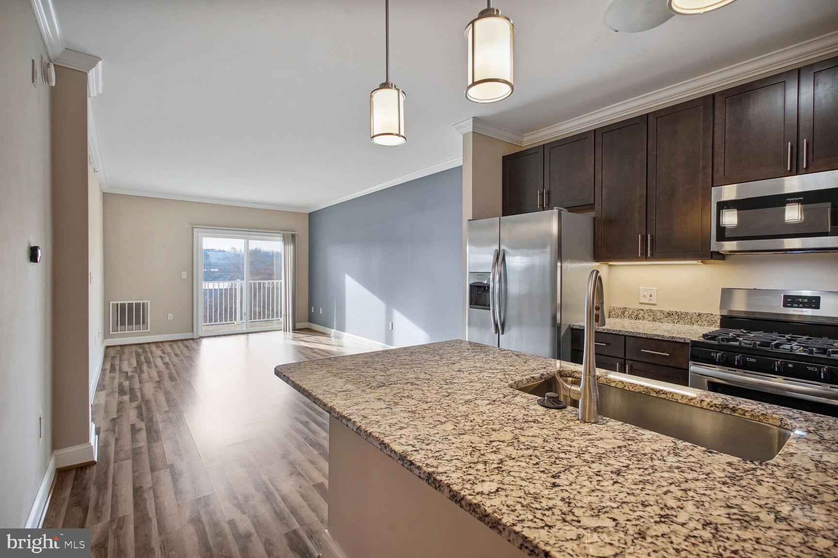 6301 Edsall Road, Unit 423 Alexandria, VA 22312 - Photo 6 of 21 View into living room
