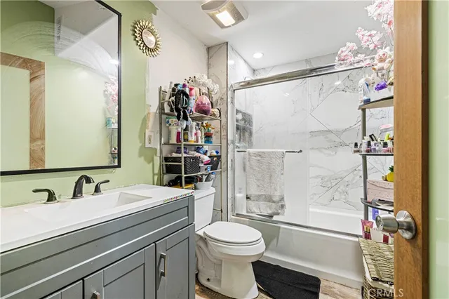 a room with sink washer and dryer