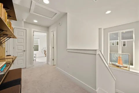 workspace with wooden floor and windows