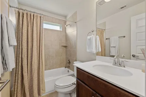 a backyard of a house with seating space