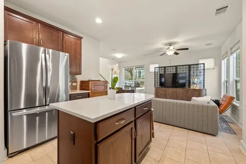 a kitchen with counter top space cabinets and stainless steel appliances