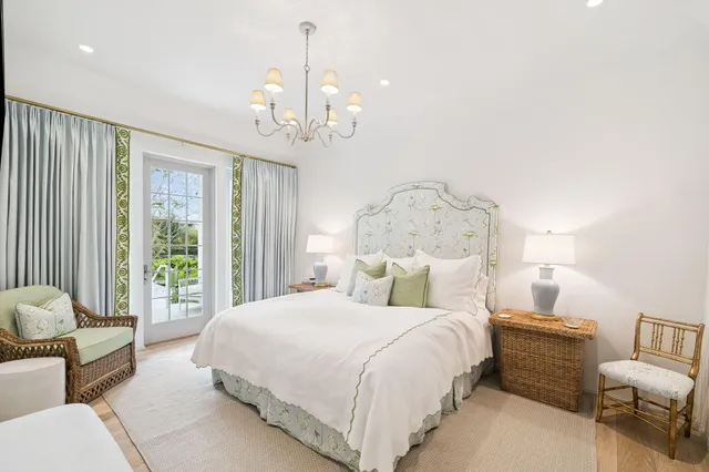 a bathroom with a sink a toilet and a shower curtain