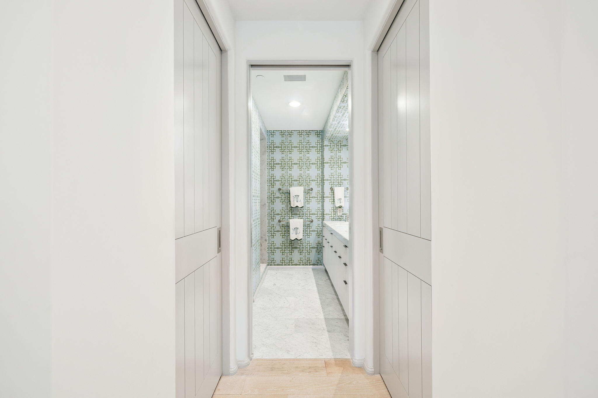 45 West Solaire Way Inlet Beach, Unit 106 Inlet Beach, FL 32461 - Photo 14 of 47 a view of a hallway with wooden floor and a large window