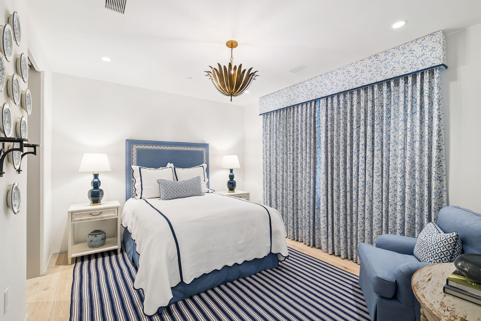 45 West Solaire Way Inlet Beach, Unit 106 Inlet Beach, FL 32461 - Photo 21 of 47 a bedroom with a bed and wooden floor