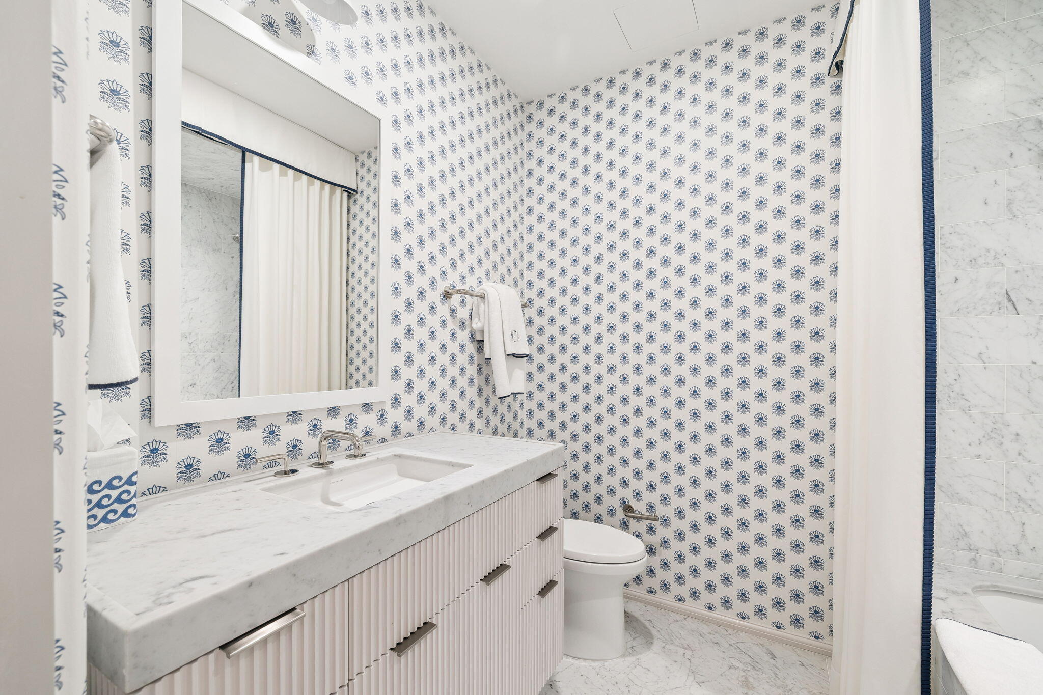 45 West Solaire Way Inlet Beach, Unit 106 Inlet Beach, FL 32461 - Photo 26 of 47 a bathroom with a sink a toilet and a shower curtain