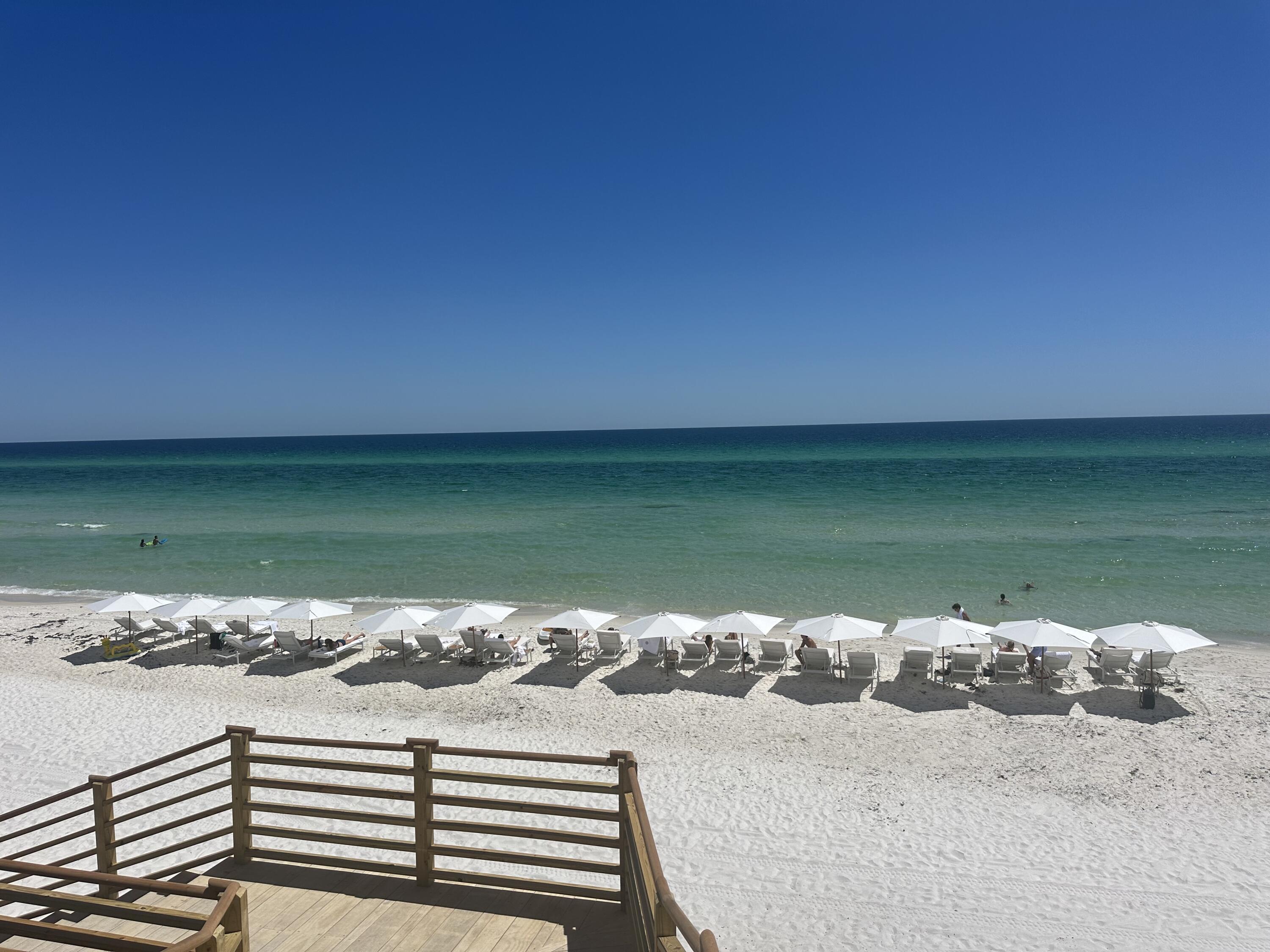45 West Solaire Way Inlet Beach, Unit 106 Inlet Beach, FL 32461 - Photo 32 of 47 a view of a lake from a lake