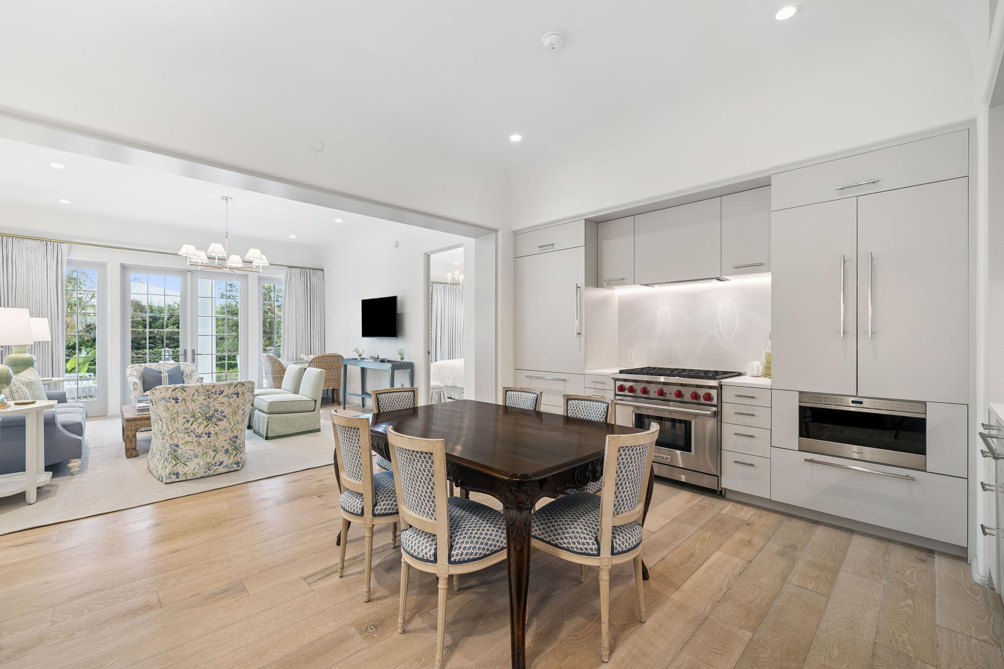 45 West Solaire Way Inlet Beach, Unit 106 Inlet Beach, FL 32461 - Photo 10 of 47 a view of a dining room with furniture window and wooden floor