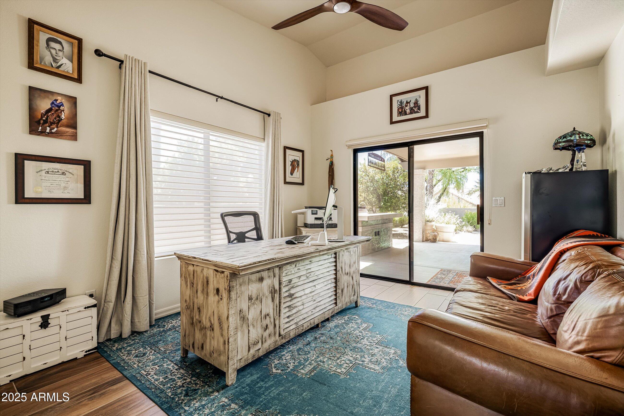 25821 North Bolero Bend Rio Verde, AZ 85263 - Photo 21 of 42 a living room with furniture and a window