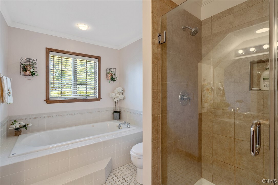 3104 Corlear Drive Lysander, NY 13027 - Photo 19 of 29 En suite bath with glass tiled shower and jacuzzi