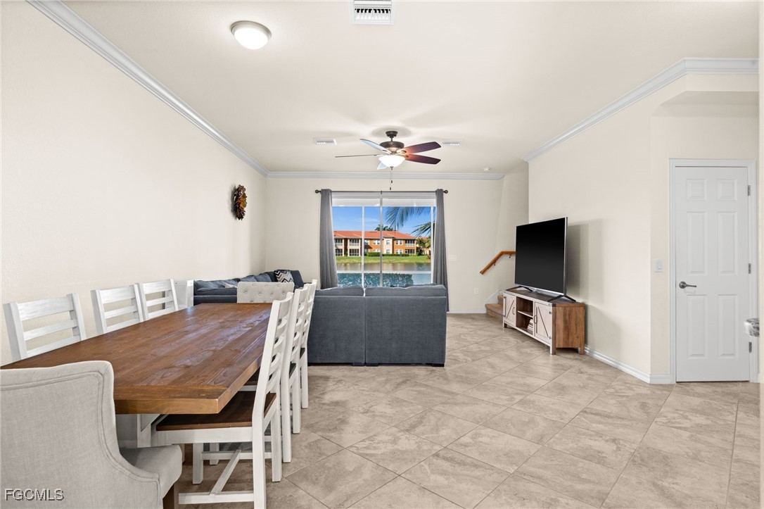 10173 Via Colomba Circle Fort Myers, FL 33966 - Photo 13 of 50 a view of a livingroom with furniture and a flat screen tv